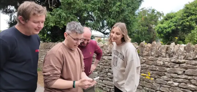 GPS Treasure Hunt group looking at smartphone