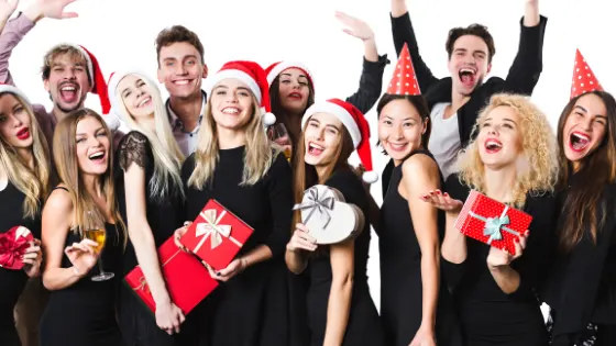 Unusual Activities for a Christmas Party group of people in festive attire