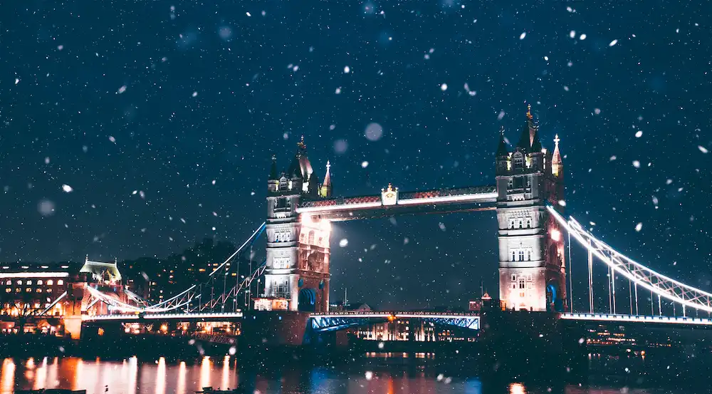 Famous Tower Bridge in the evening snow, London, England